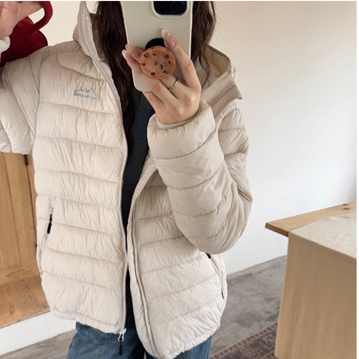 Ladies ultralight down jacket with removable hood and elastic hem Lune London