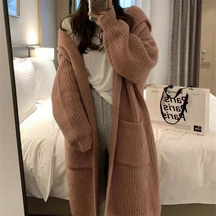 Long coat for women with an elegant ribbed structure and practical pockets Lune London