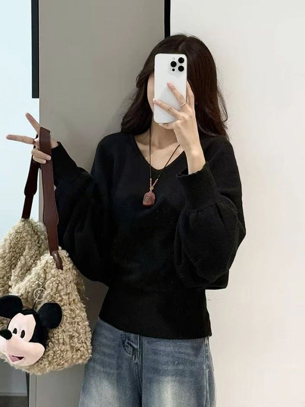 Pull moderne pour femmes avec col en V et ceinture à nouer optionnelle Chic & Stil