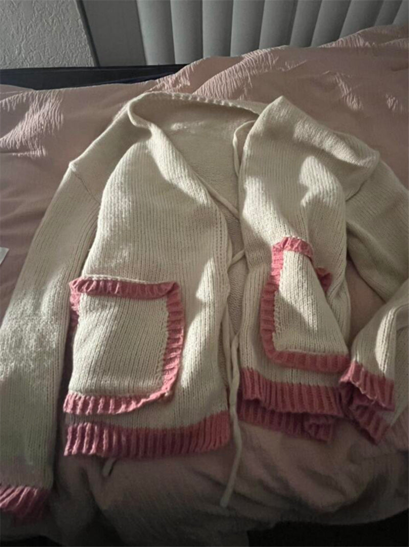 Ladies casual knit jacket with a unique tie detail and large pockets Lune London