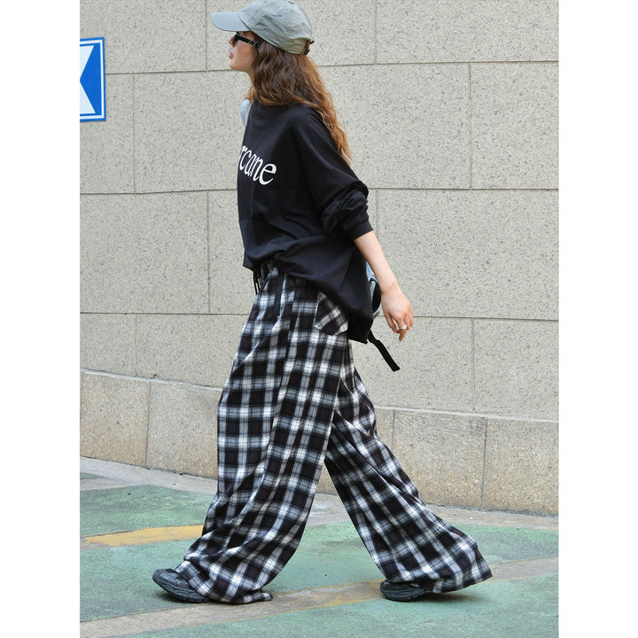 Pantalon à carreaux confortable pour femmes avec taille élastique et poches latérales Chic & Stil