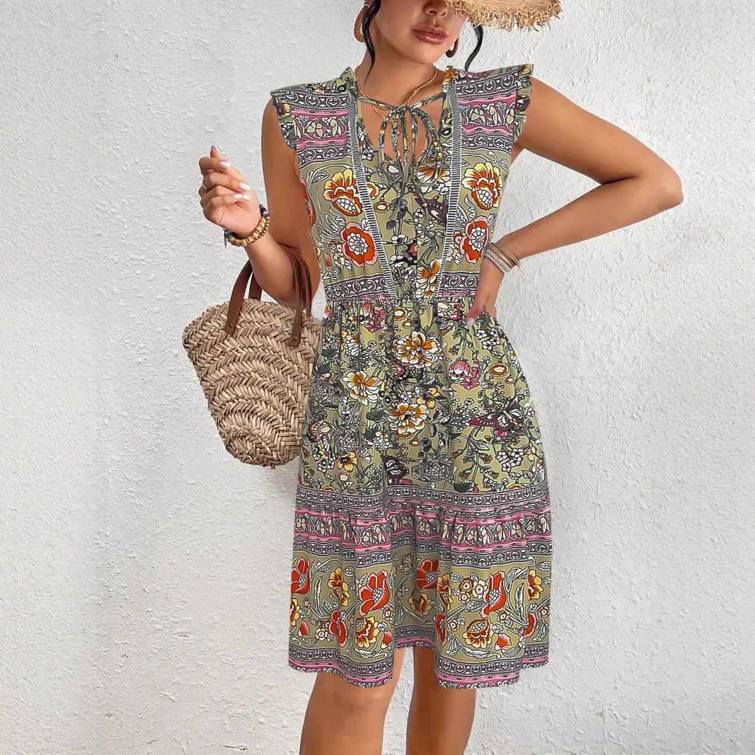 Summer midi dress for women with a playful floral pattern and a relaxed fit Lune London