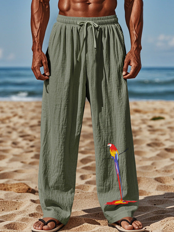 Light beach pants for men with colorful parrot design Lune London