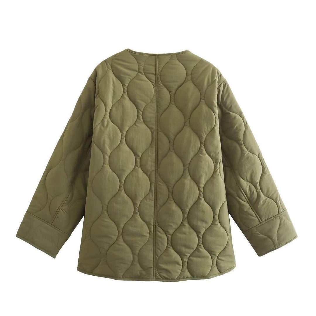 Quilted transition jacket for women with practical button closure and warm inner lining Lune London