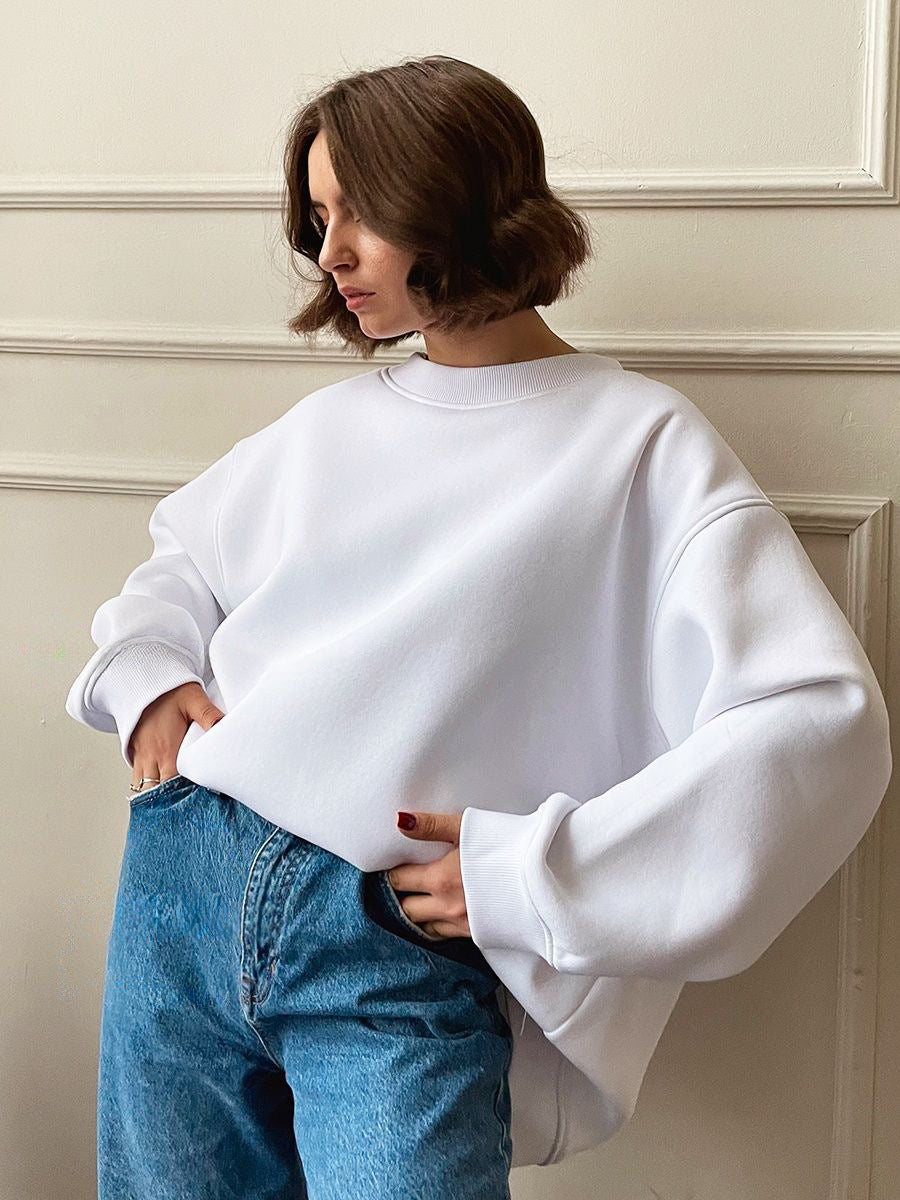 Woman Oversized sweatshirt with a relaxed fit and modern chic accents and style