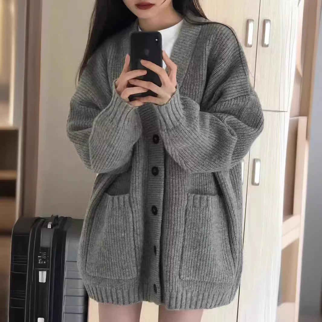 Ladies Large knitted cardigan with deep V-neck and practical pockets Lune London