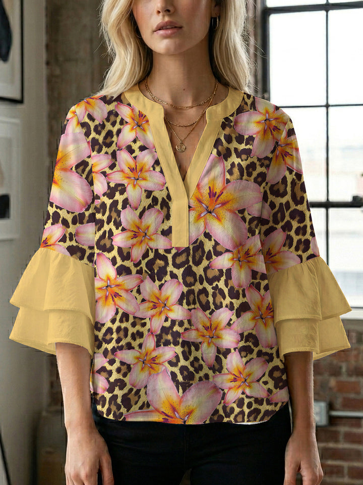 Women's casual blouse with ruffled sleeves and botanical print Lune London