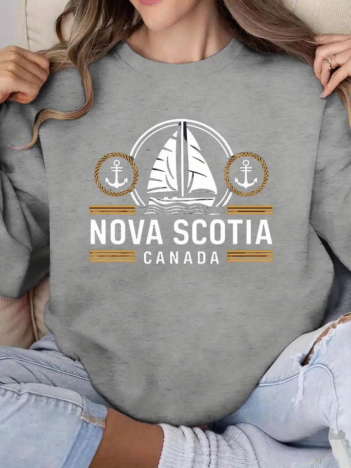 Sweat-shirt pour femmes avec un motif de voile maritime et une lettrage Chic & Stil discret