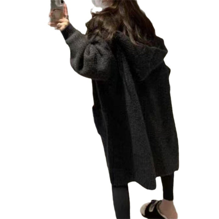 Long coat for women with an elegant ribbed structure and practical pockets Lune London