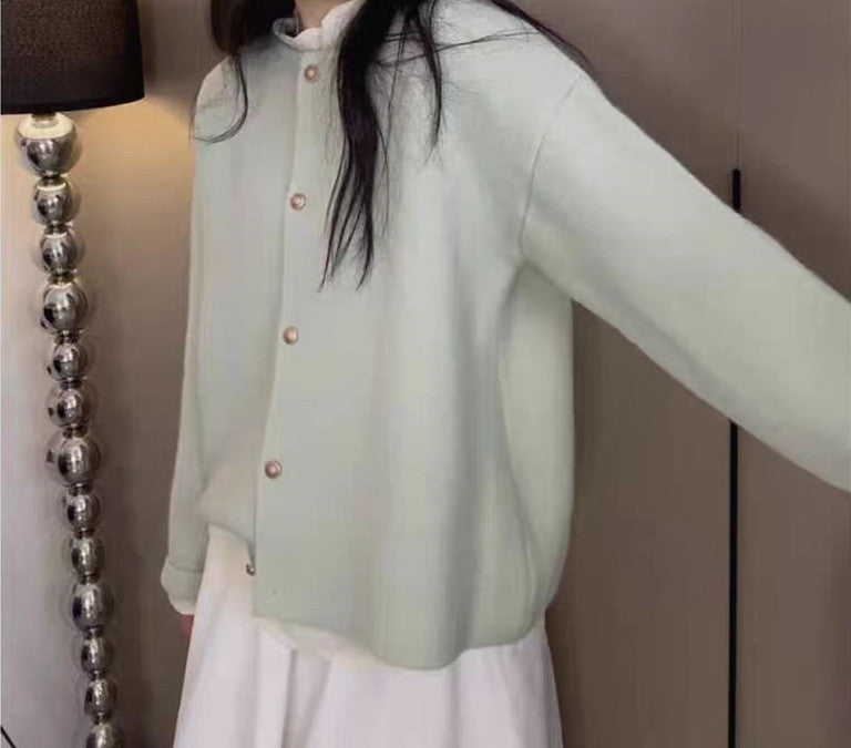 Women's chunky knit cardigan with elegant button placket and relaxed fit Lune London