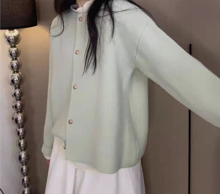 Women's chunky knit cardigan with elegant button placket and relaxed fit Lune London