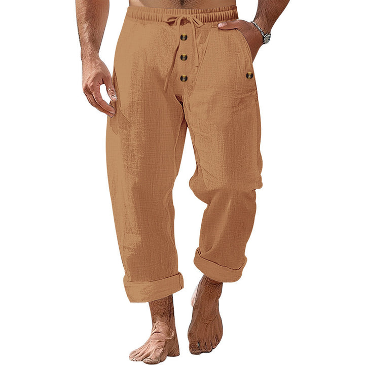 Casual beach pants for men with elastic waistband and practical button details Lune London