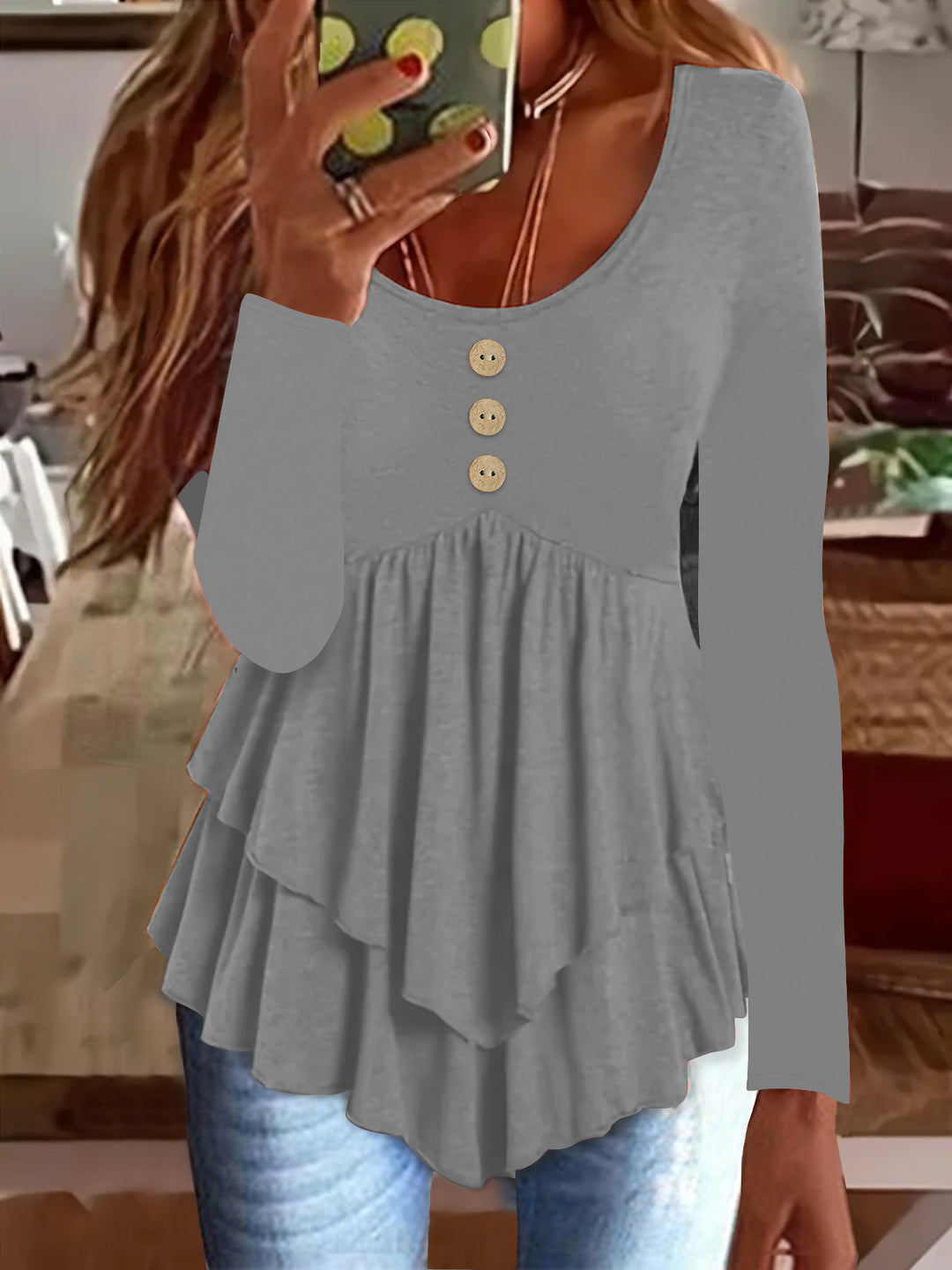 Long sleeve women's blouse with layered design and decorative button details Lune London