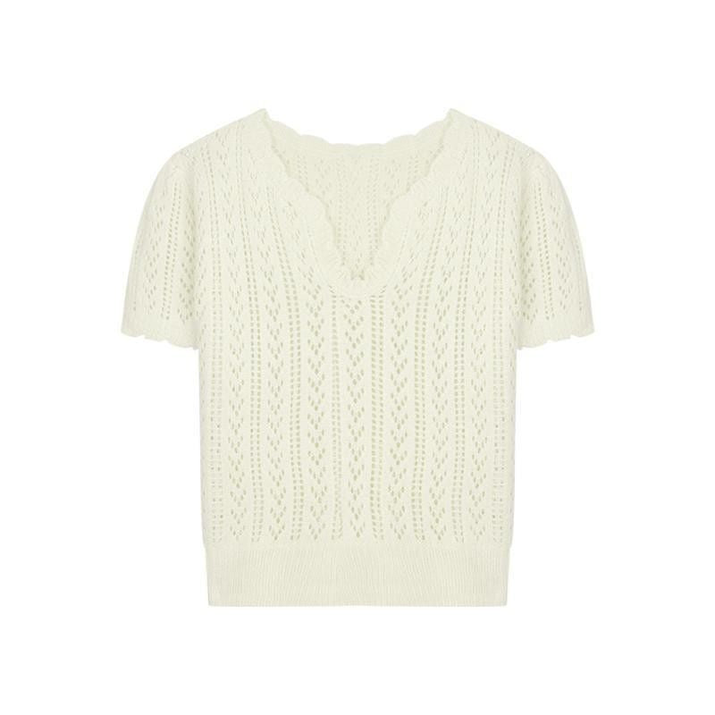 Knitted sweater for women with a feminine openwork pattern Lune London
