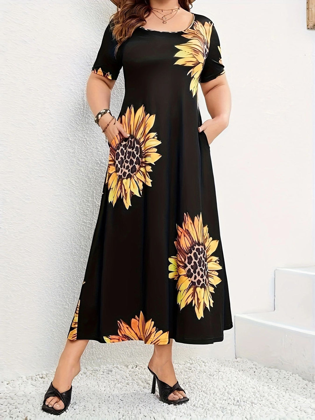Summer maxi dress for women with sunflower floral pattern and practical pockets Lune London