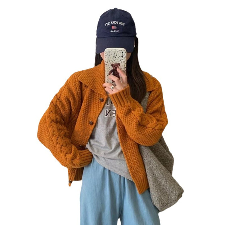 Women's oversized knitted jacket with cable design and chic texture and style
