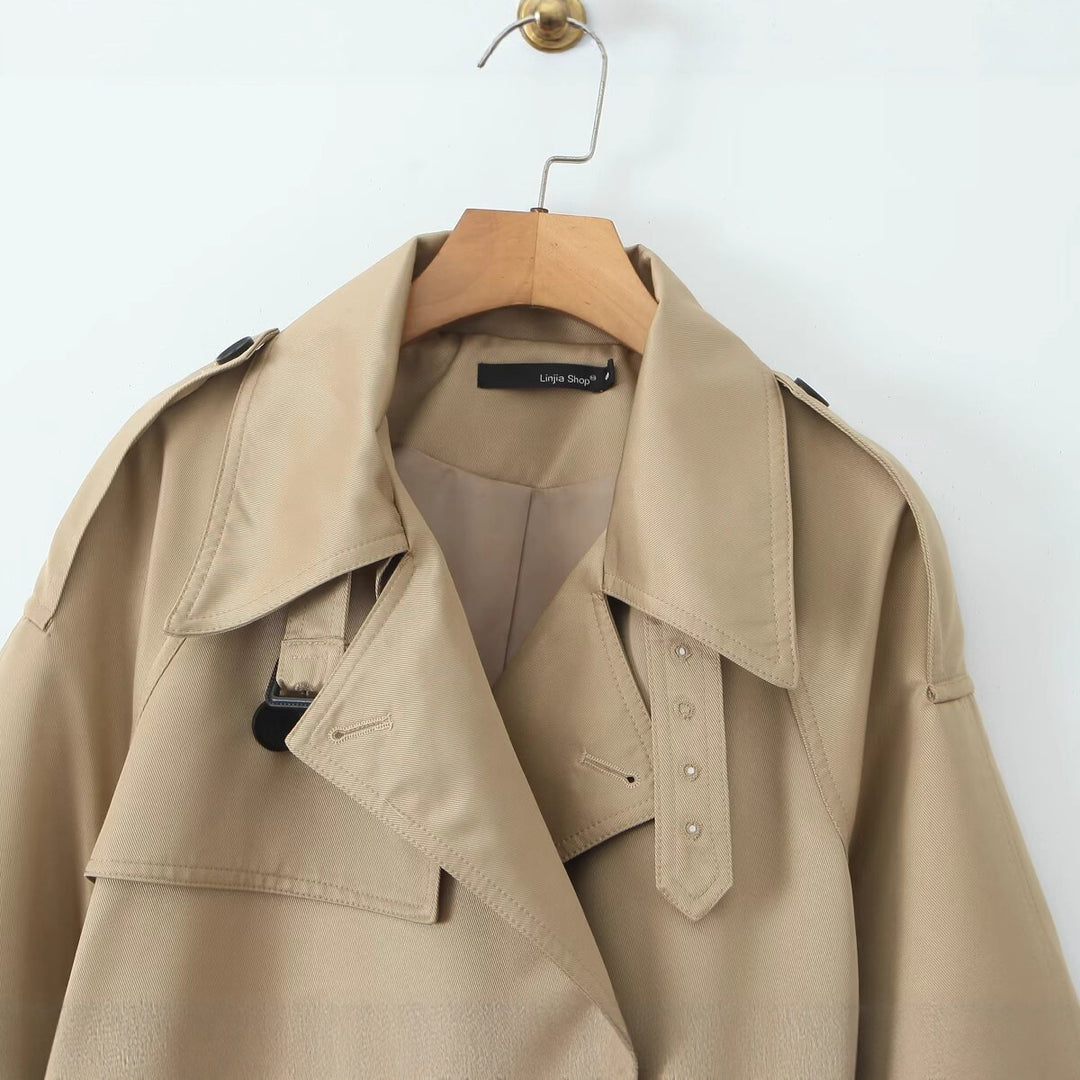 Trendy women's trench coat with a waist belt and practical pockets Lune London