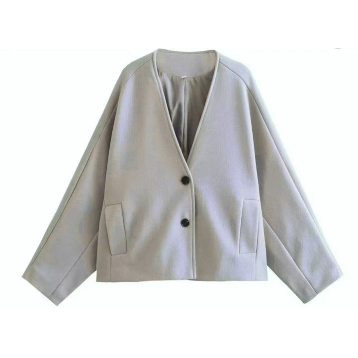 Veste féminine à la mode avec une coupe élégante et des poches pratiques Chic & Stil