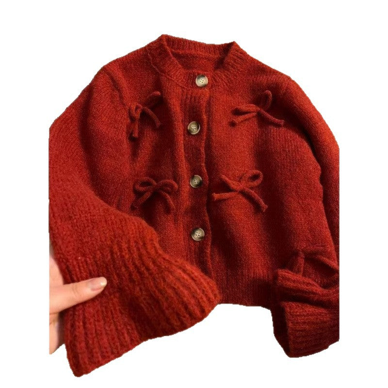 Cardigan pour femmes avec des nœuds décoratifs dessus