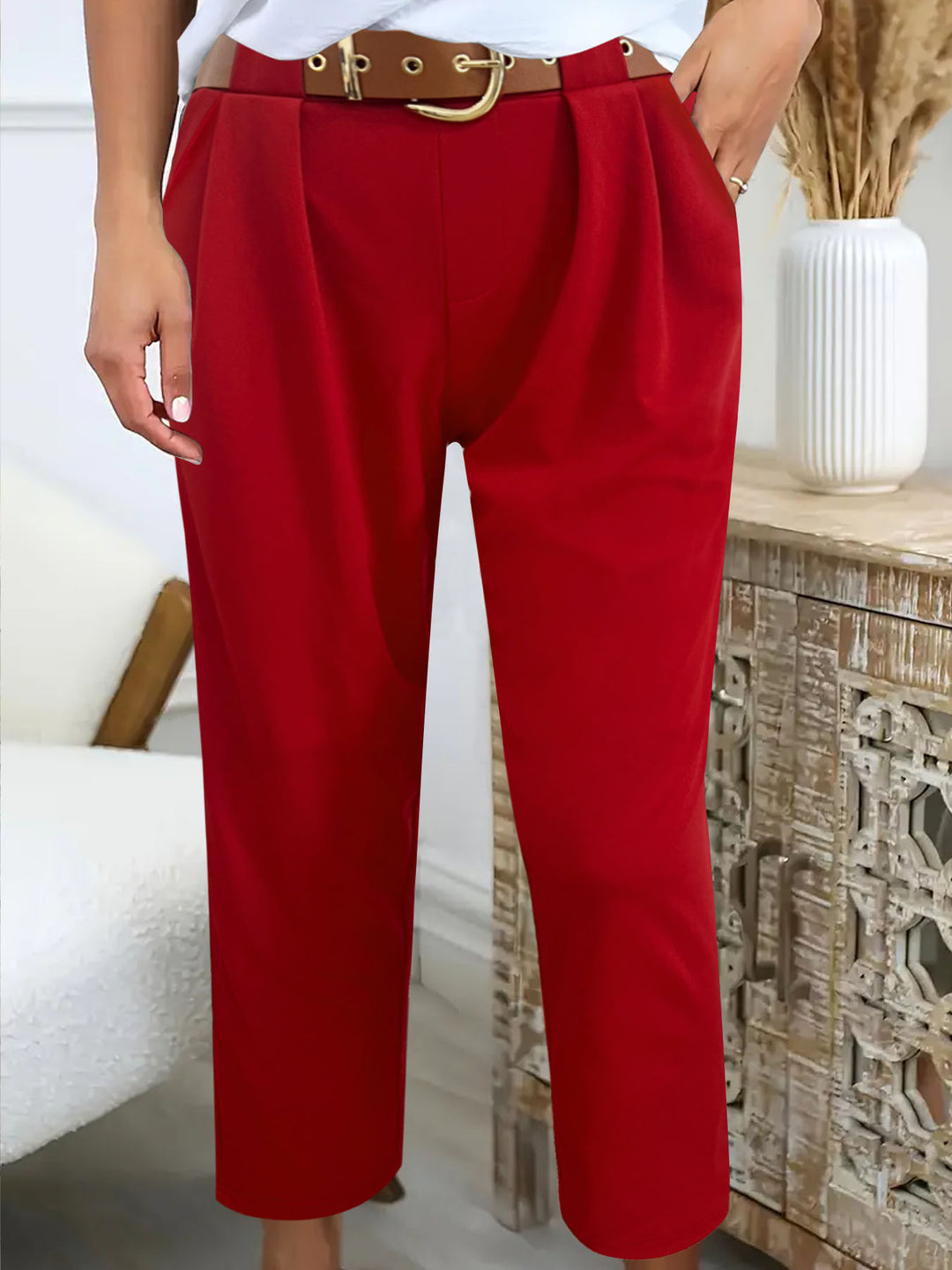 Elegant high-waisted pants for women with decorative pleats and practical pockets Lune London