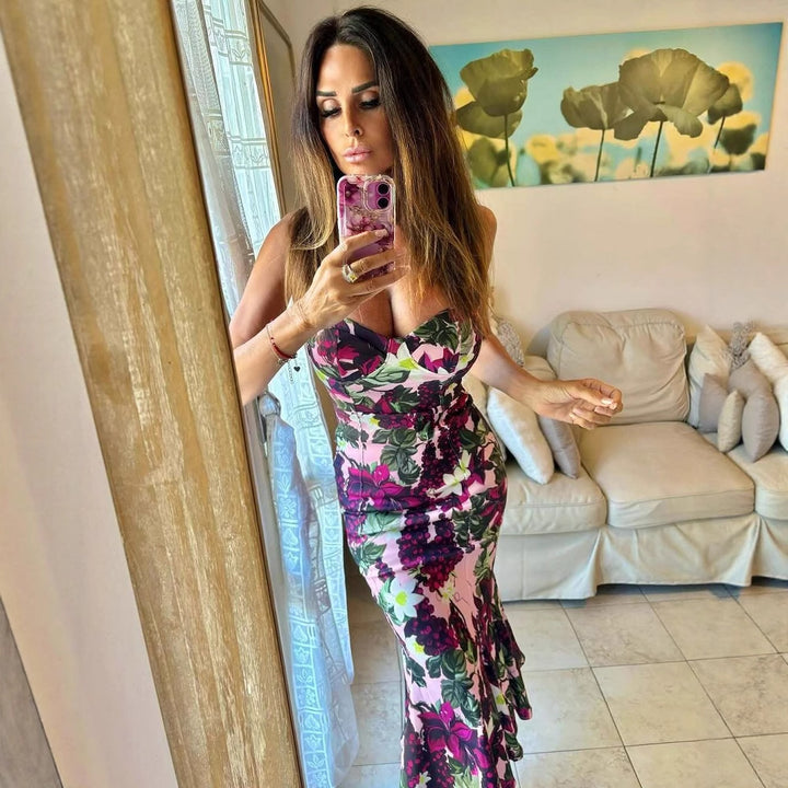 Maxi dress for women with a floral design featuring a fluid hem and a deep V neck Lune London