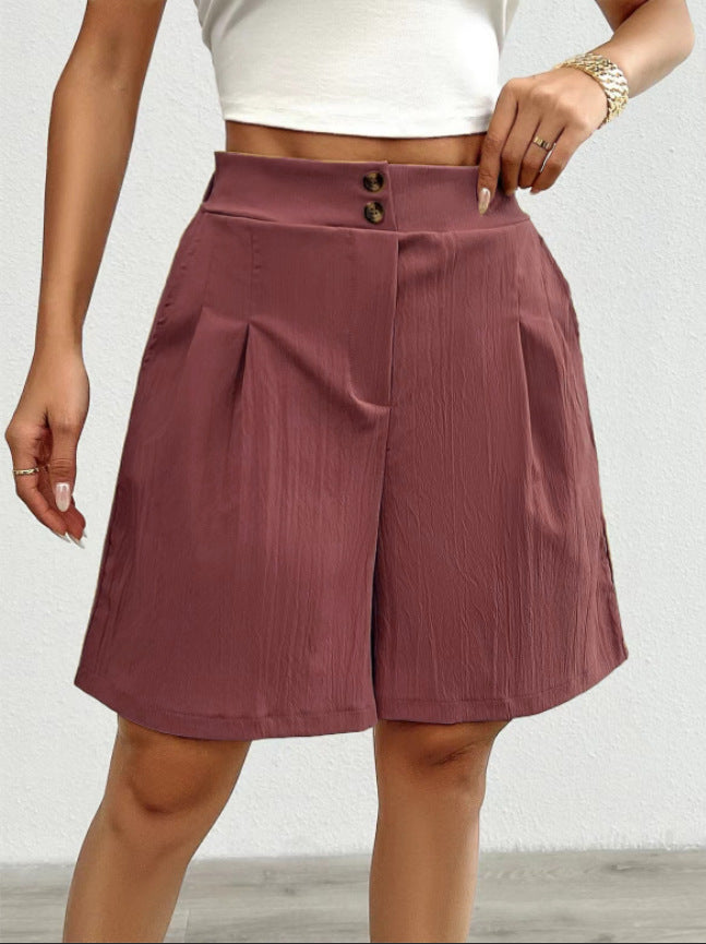 Lune London Elegant women's shorts with button closure and pleated design