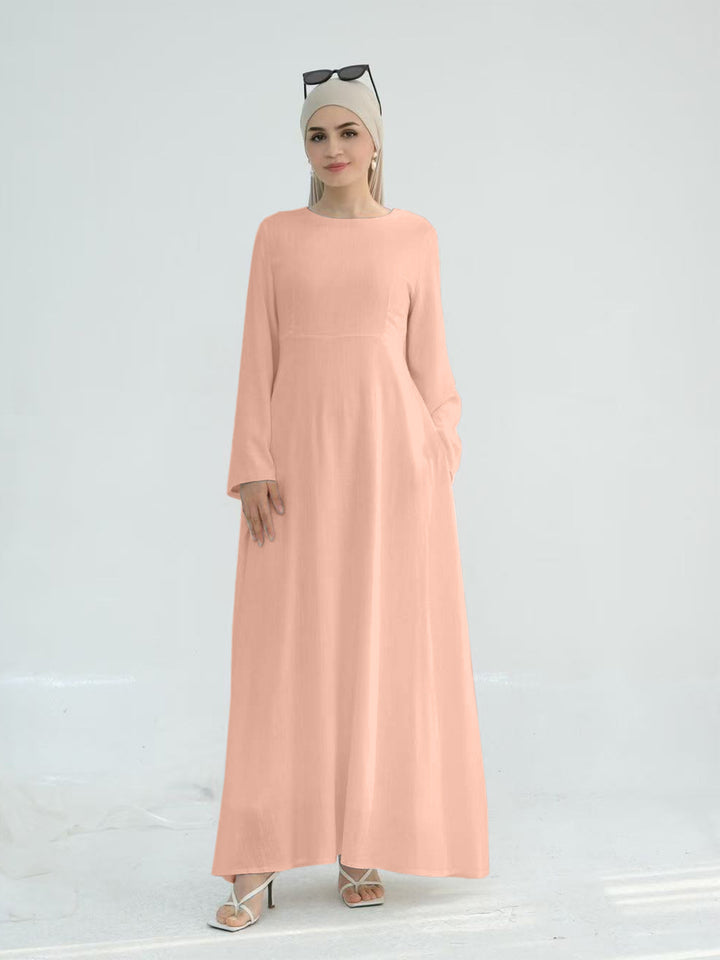 Elegant maxi dress for women with long sleeves and side pockets Lune London