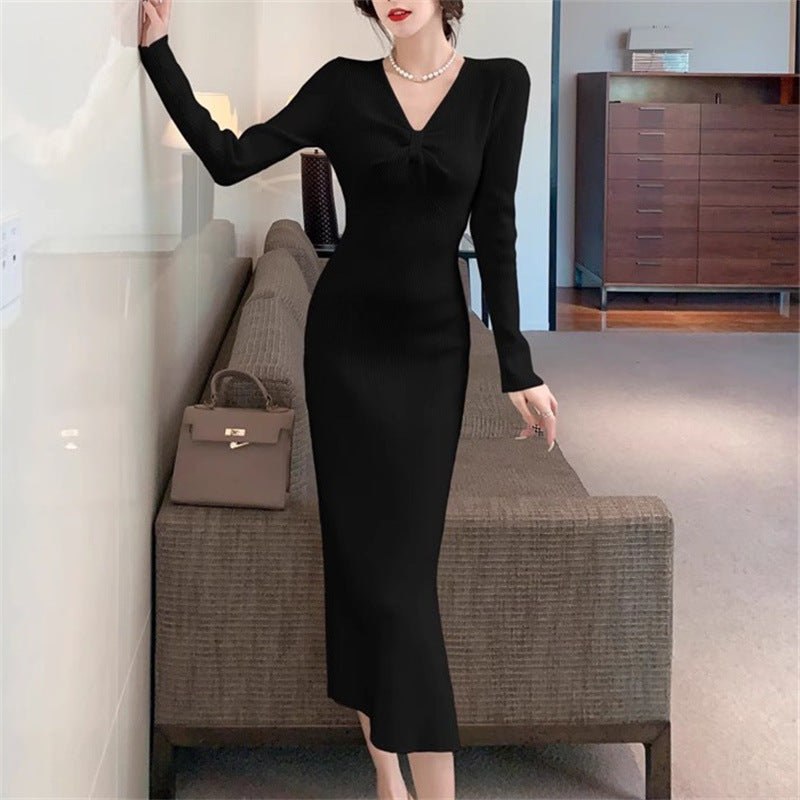 Knit dress for women with plunging V-neck and elegant ribbed structure Lune London