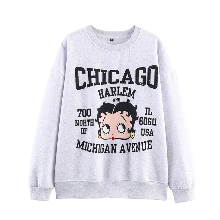 Casual women's sweater with playful graphic print and relaxed fit Chic und Style