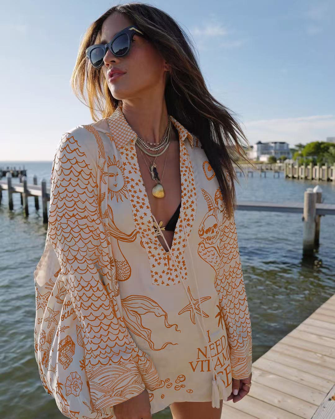 Casual beach blouse for women with an artistic nautical print and an elegant V neckline Lune London
