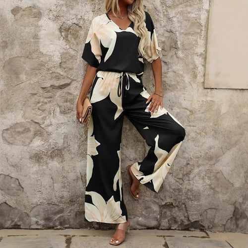Ladies Elegant Jumpsuit with floral patterns and wide leg Lune London