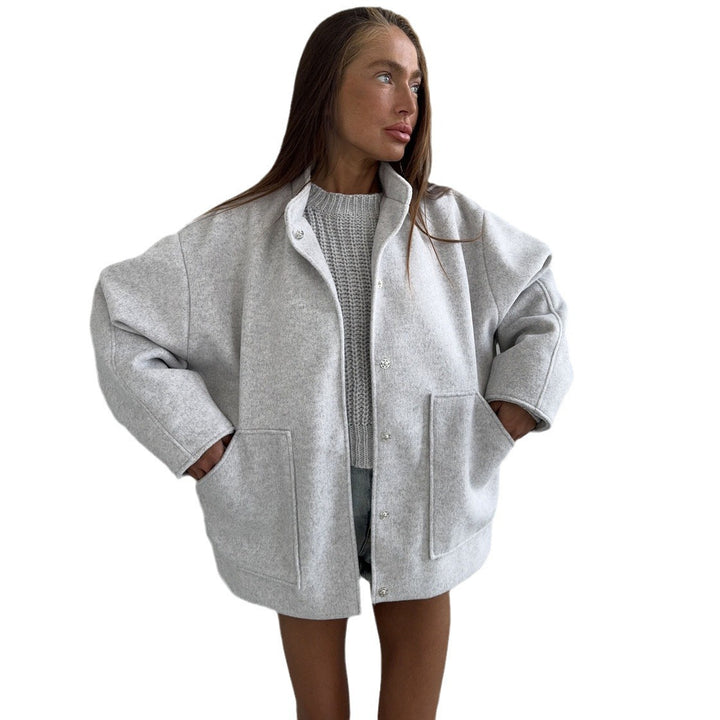 Oversized wool coat for women with simple button details and practical pockets Lune London