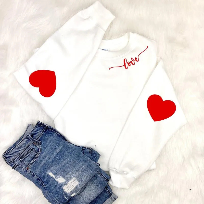 Sweatshirt femme avec design cœur et coupe décontractée Chic & Stil