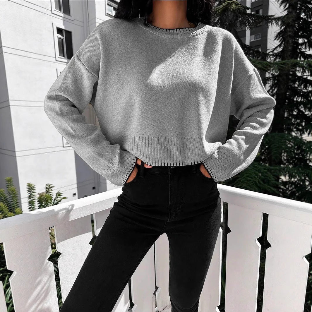 Cropped knit sweater for women with round neckline and ribbed details Lune London