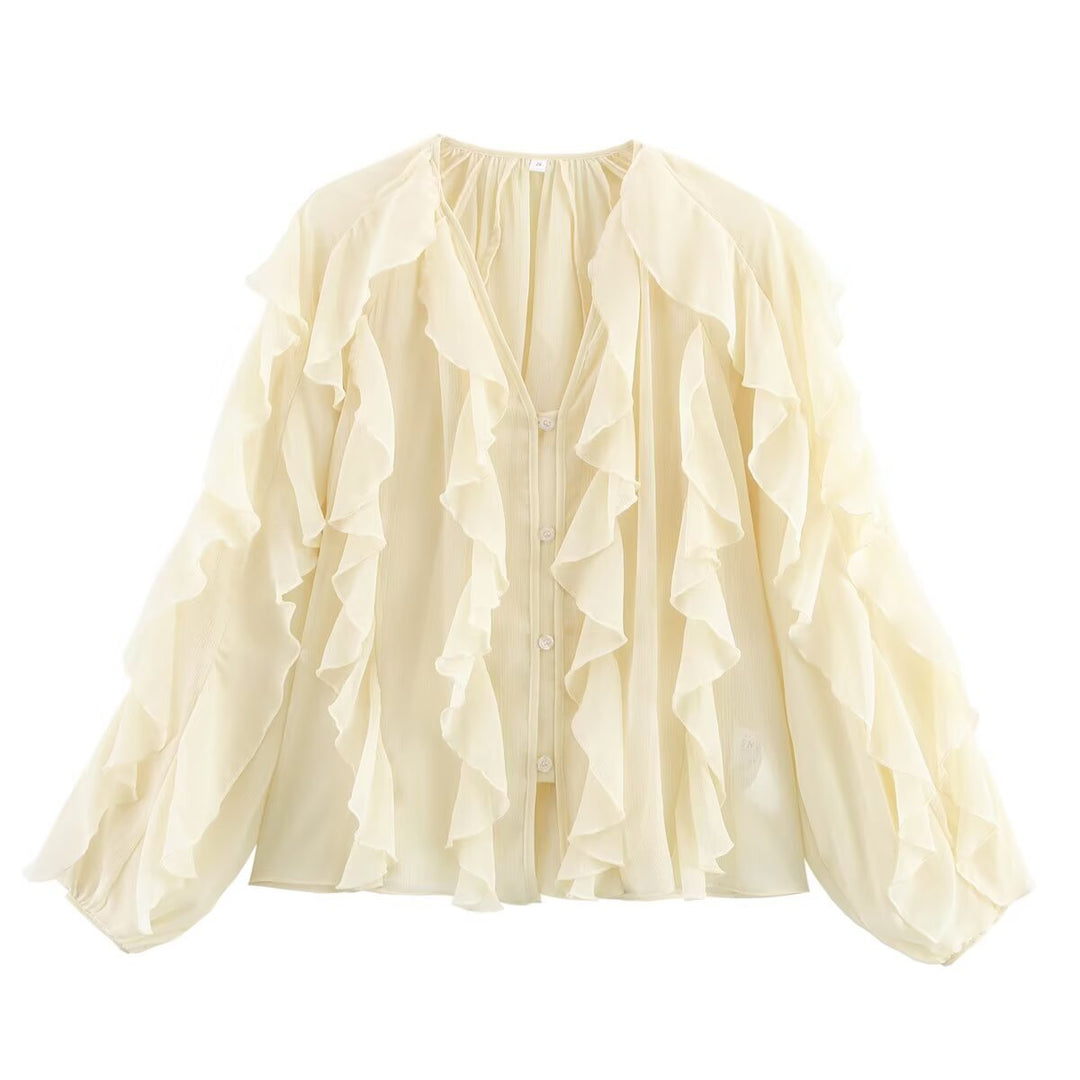 Blouse à volants élégante pour femme avec manches volumineuses Chic & Stil