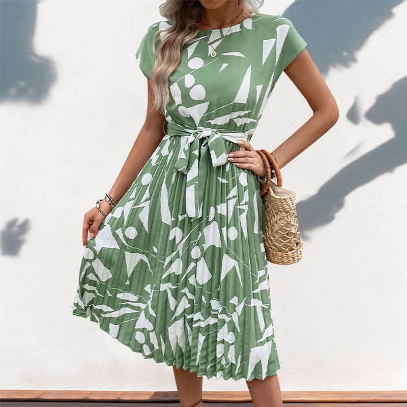 Lune London A-line pleated dress for ladies with abstract print and fitted belt