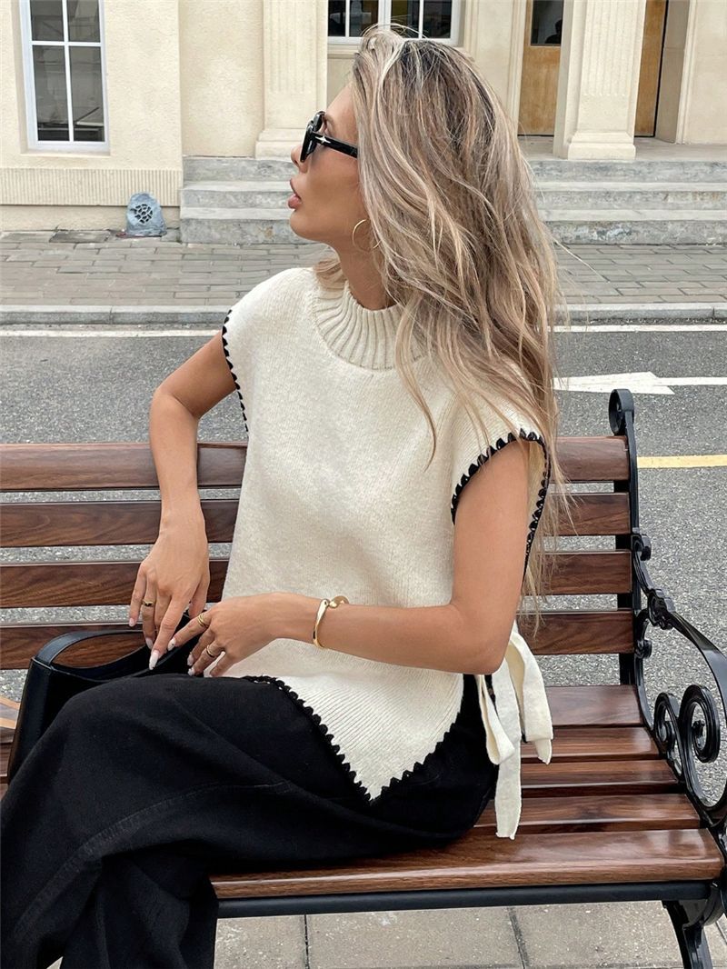 Knit top for women with unique cutouts and a playful knot Lune London