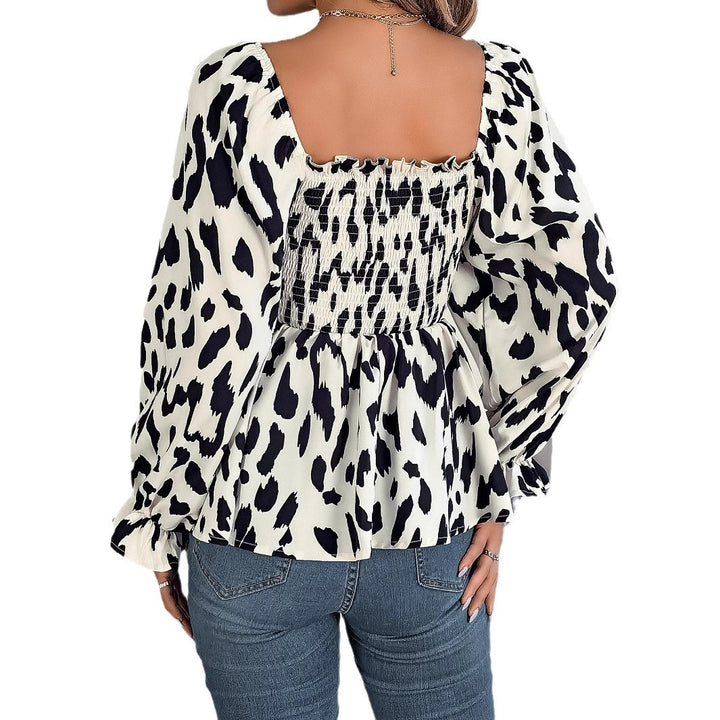Trendy women's blouse with ruffles and chic animal print Lune London