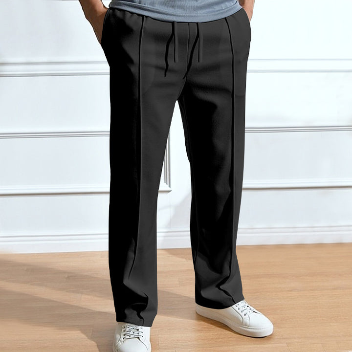 Men's leisure pants with elastic waistband and side snap buttons Lune London