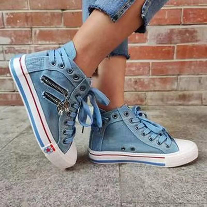High-top sneakers for women with a modern vintage look featuring trendy zipper details Lune London