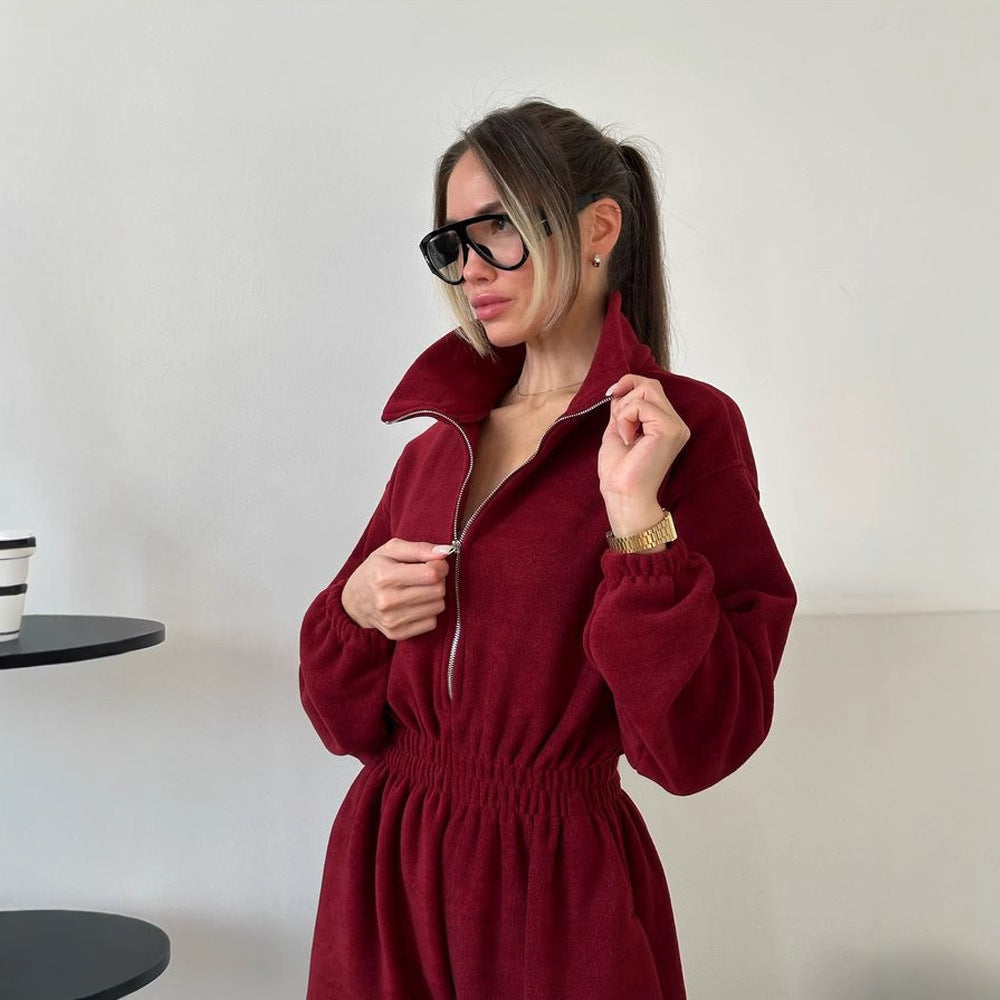 Ladies fleece jumpsuit with large puff sleeves and a high collar Lune London