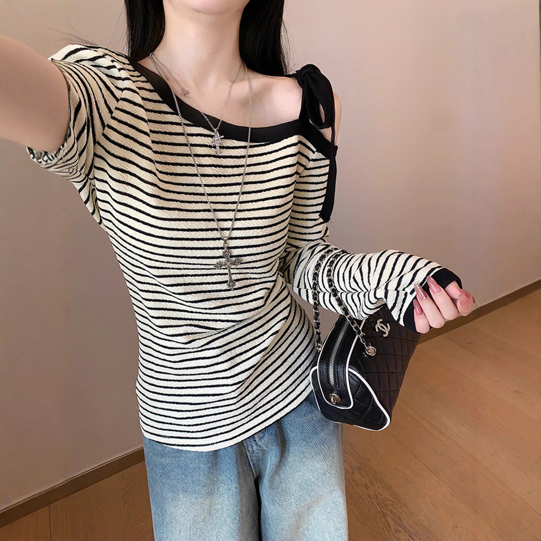 Ladies long sleeve top with off-shoulder design and fashionable stripes Chic & Stil