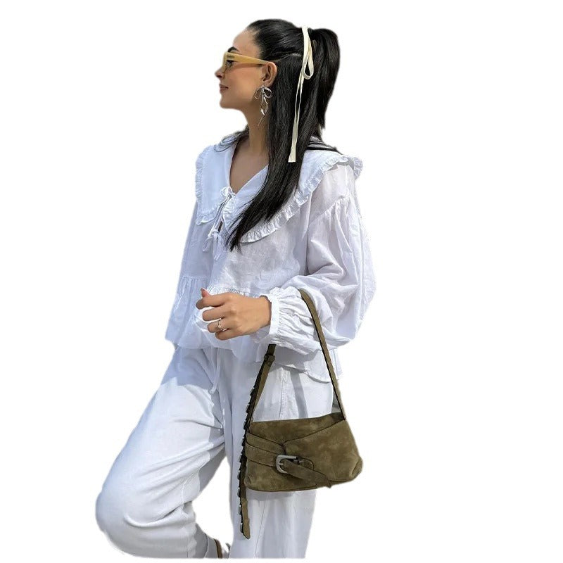 Blouse ludique pour femmes avec ourlet à volants et fermeture par nœud Chic & Stil