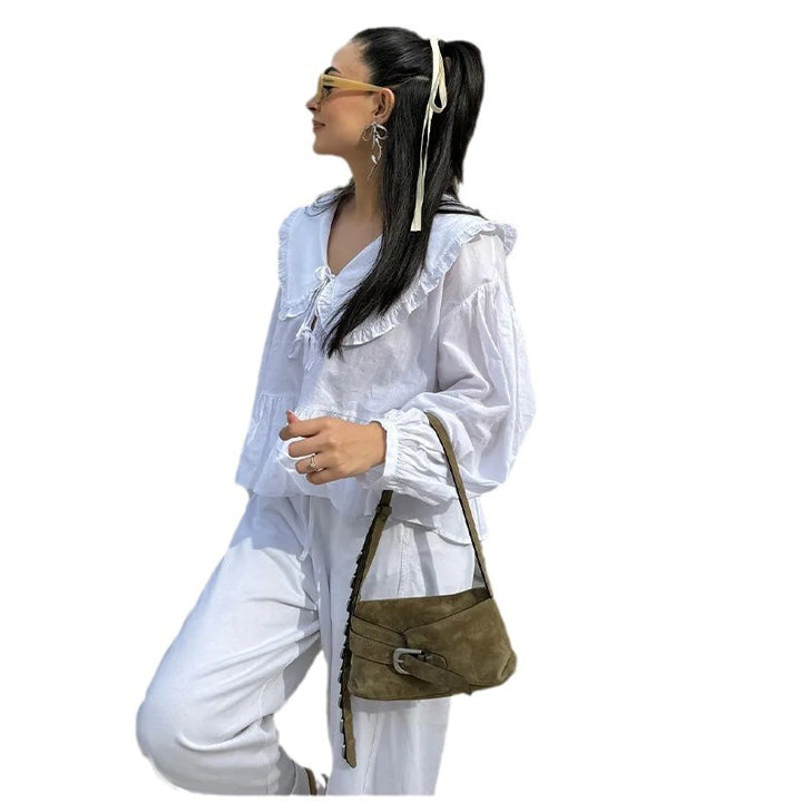 Blouse ludique pour femmes avec ourlet à volants et fermeture par nœud Chic & Stil