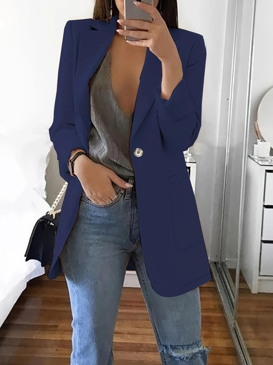 Elegant women's jacket with a deep V neckline and practical pockets Lune London