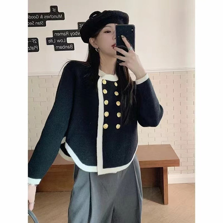 Elegant ladies cardigan with gold button details and contrasting finishes Lune London
