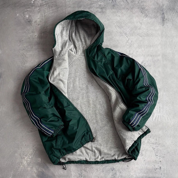 Veste de coupe-vent pour femmes avec capuche doublée et poches latérales Chic & Stil