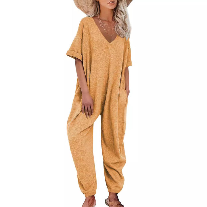 Oversized jumpsuit for women with deep V-neckline and casual pockets Lune London