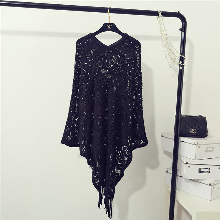 Knit poncho for women with an eye-catching crochet pattern and fashionable fringes Lune London