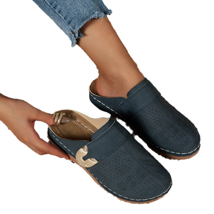 Women Breathable Clogs with trendy perforations and an adjustable strap Lune London